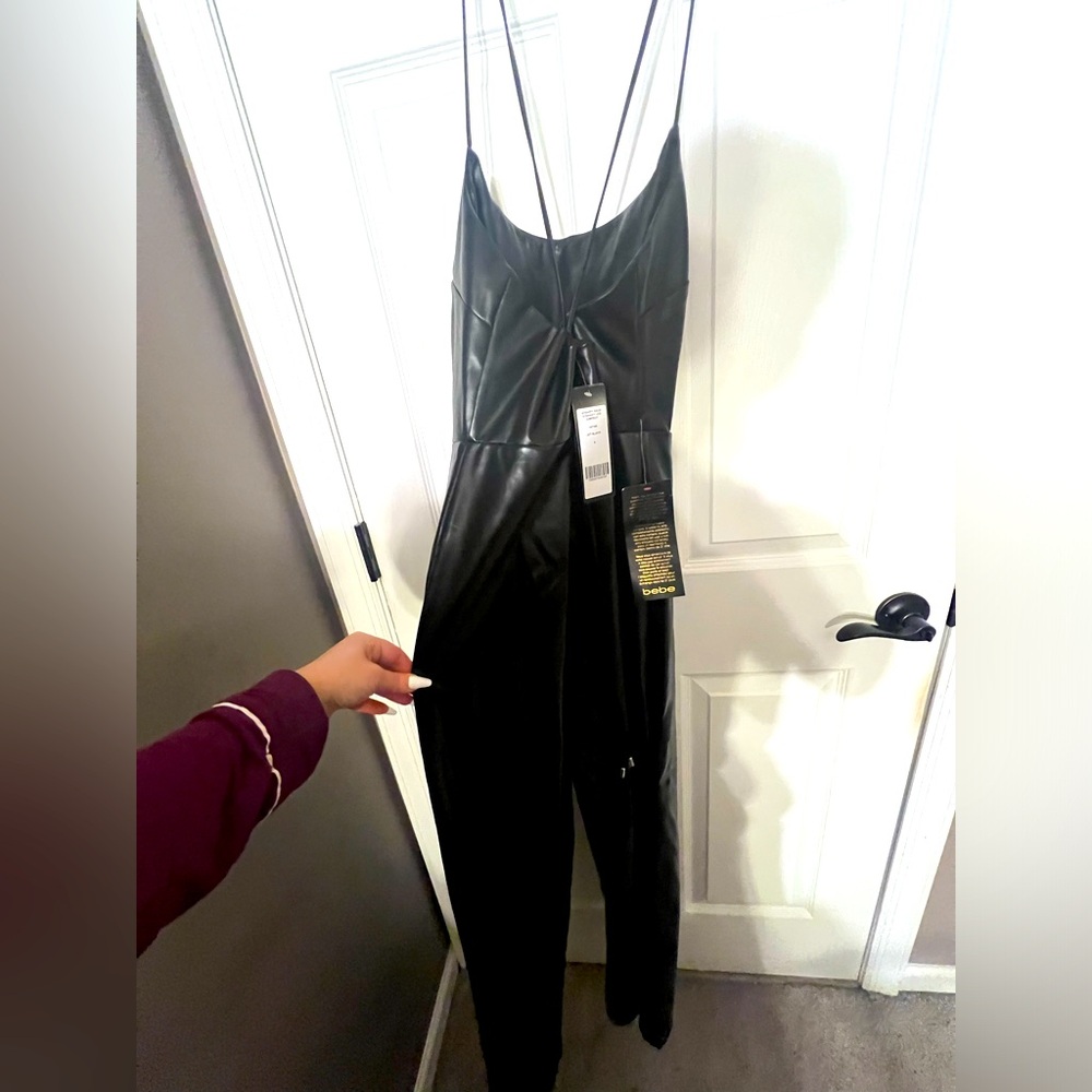 Bebe,  size, small leather straight leg jumpsuit with adjustable straps black